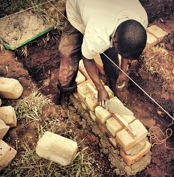 Constructing the foundation of the SafeWorld medical facility in August 2013.